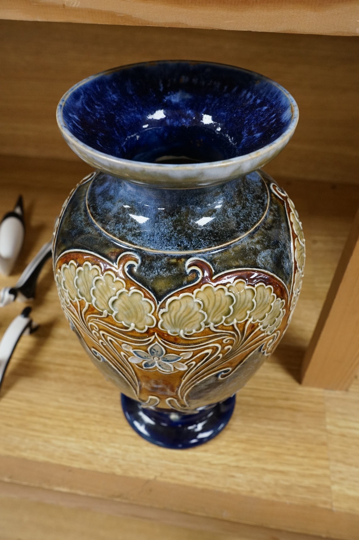 A Doulton Lambeth vase by Eliza Simmance, with repaired foot, 28cm high